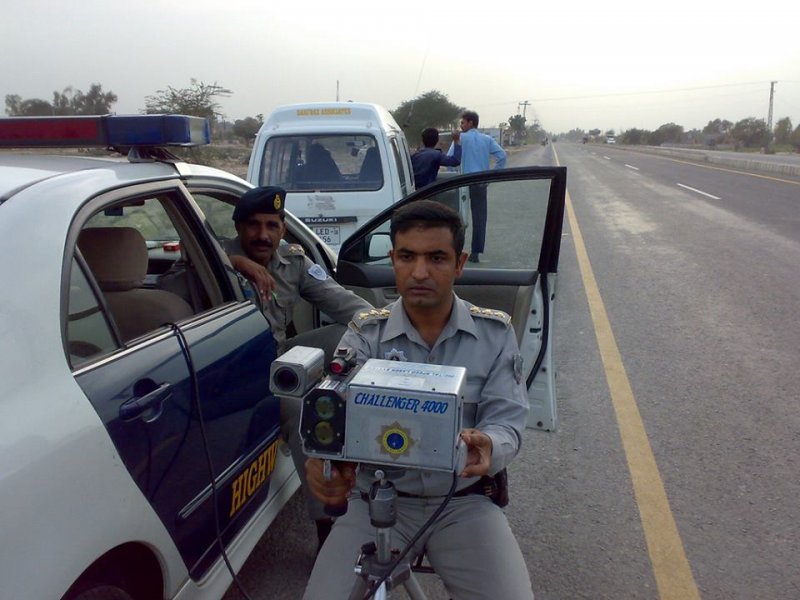 Pakistan's motorway police checking vehicle speed., KEEPING THE MOTORWAYS SAFE